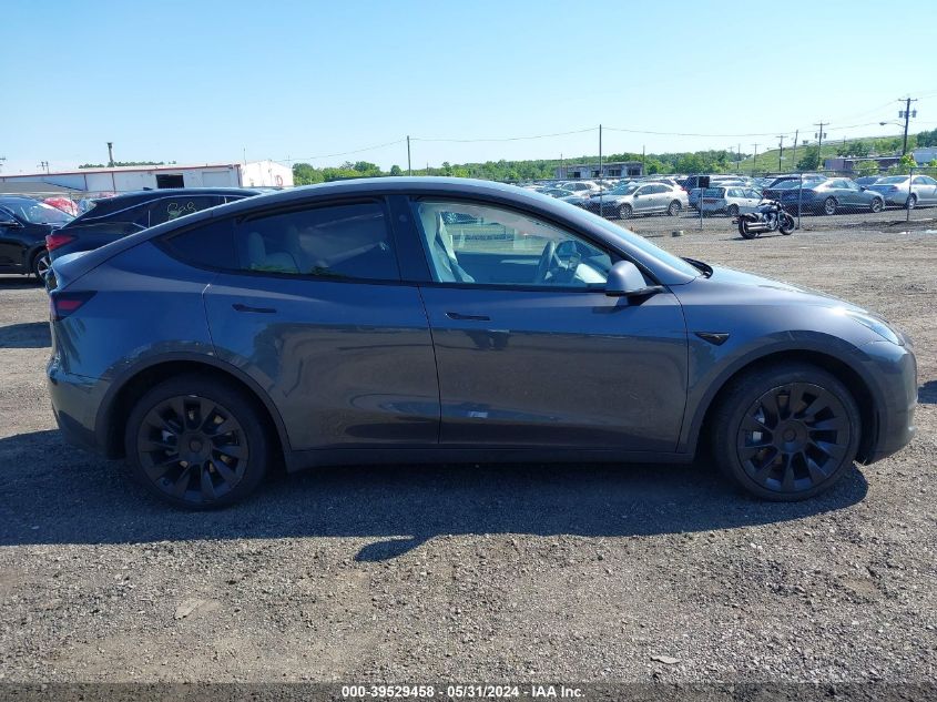 2023 Tesla Model Y Awd/Long Range Dual Motor All-Wheel Drive VIN: 7SAYGDEE7PF872944 Lot: 39529458