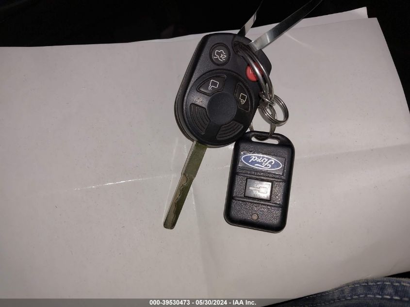 2014 Ford Focus Se VIN: 1FADP3F23EL391048 Lot: 39530473