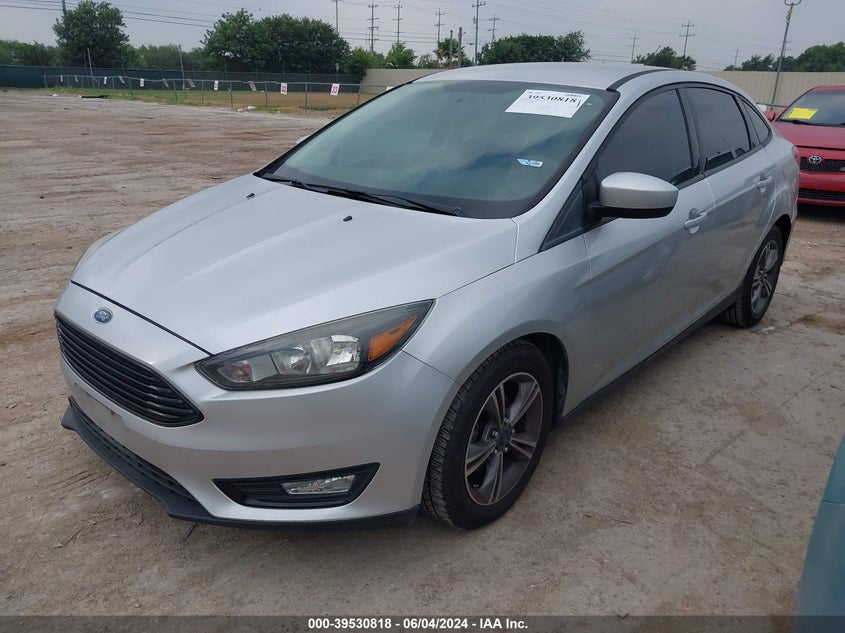 VIN 1FADP3FE6JL269028 2018 FORD FOCUS SE