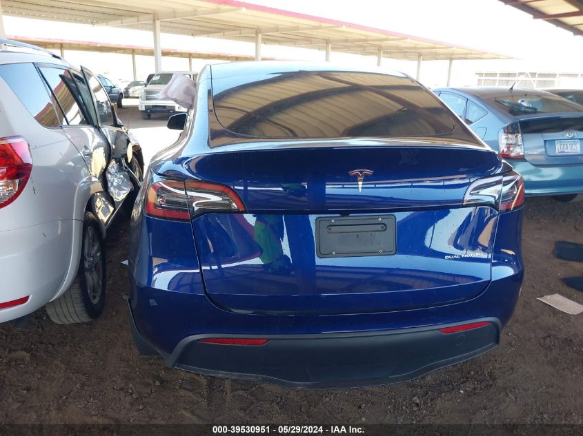 2023 Tesla Model Y Awd/Long Range Dual Motor All-Wheel Drive VIN: 7SAYGDEE1PF660864 Lot: 39530951