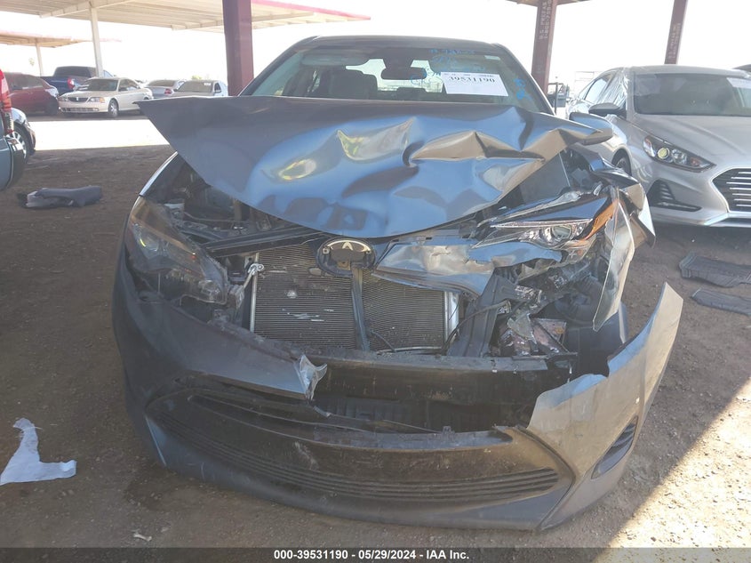 2017 Toyota Corolla Le VIN: 2T1BURHE5HC874766 Lot: 39531190