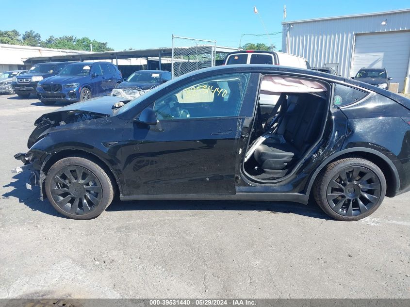 2023 Tesla Model Y Awd/Long Range Dual Motor All-Wheel Drive VIN: 7SAYGAEE3PF924567 Lot: 39531440