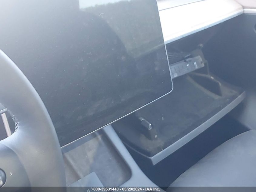 2023 Tesla Model Y Awd/Long Range Dual Motor All-Wheel Drive VIN: 7SAYGAEE3PF924567 Lot: 39531440