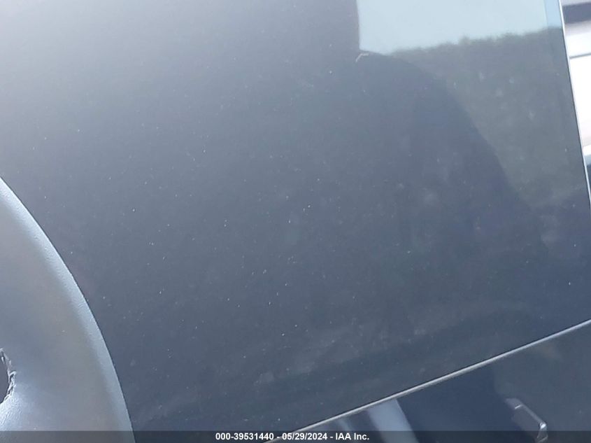 2023 Tesla Model Y Awd/Long Range Dual Motor All-Wheel Drive VIN: 7SAYGAEE3PF924567 Lot: 39531440