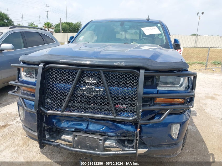 2018 Chevrolet Silverado 1500 2Lt VIN: 3GCUKREC5JG119243 Lot: 39532286
