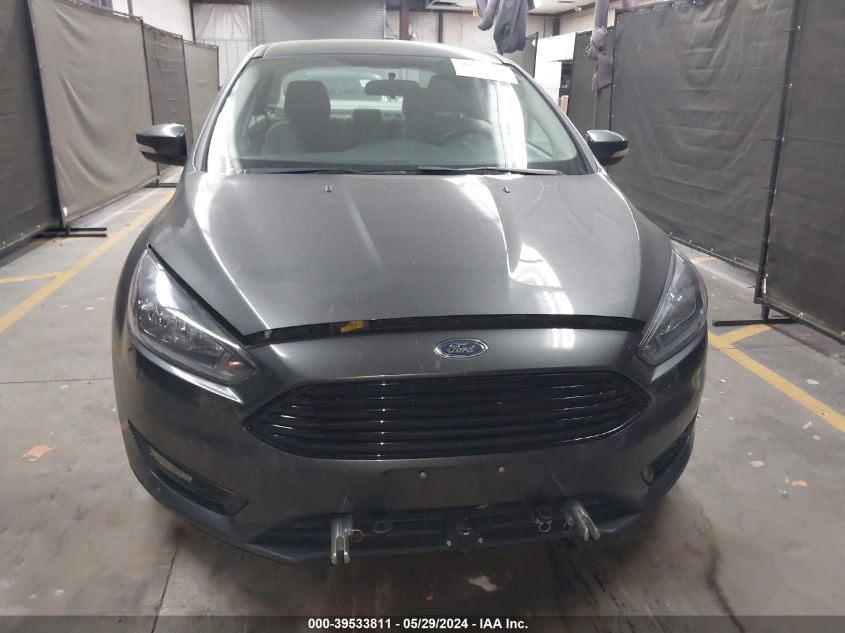 2018 Ford Focus Se VIN: 1FADP3F21JL293162 Lot: 39533811