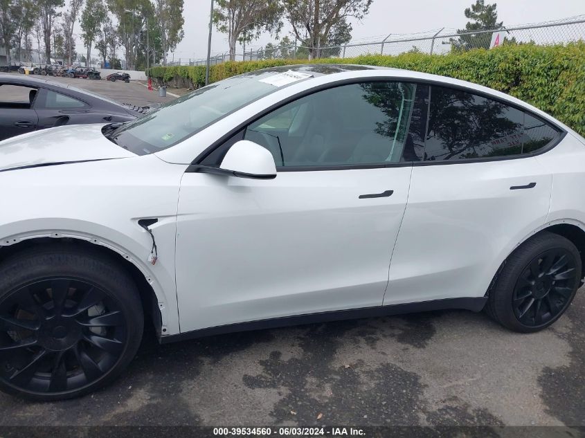 2023 Tesla Model Y Awd/Long Range Dual Motor All-Wheel Drive VIN: 7SAYGDEE8PF588223 Lot: 39534560