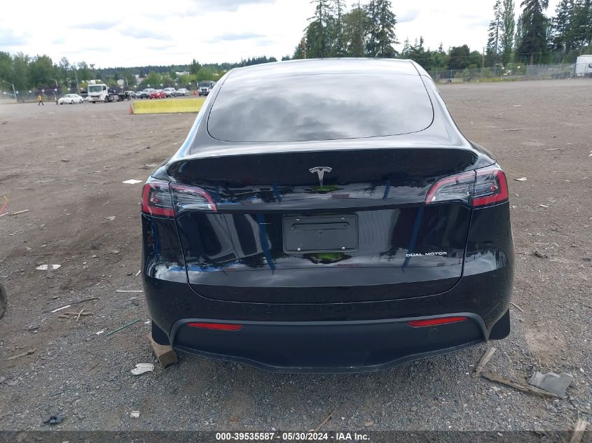 2023 Tesla Model Y Awd/Long Range Dual Motor All-Wheel Drive VIN: 7SAYGAEE7PF842082 Lot: 39535587