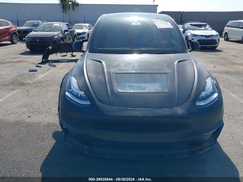 2023 Tesla Model Y Awd/Long Range Dual Motor All-Wheel Drive VIN: 7SAYGAEE5PF588355 Lot: 39538844