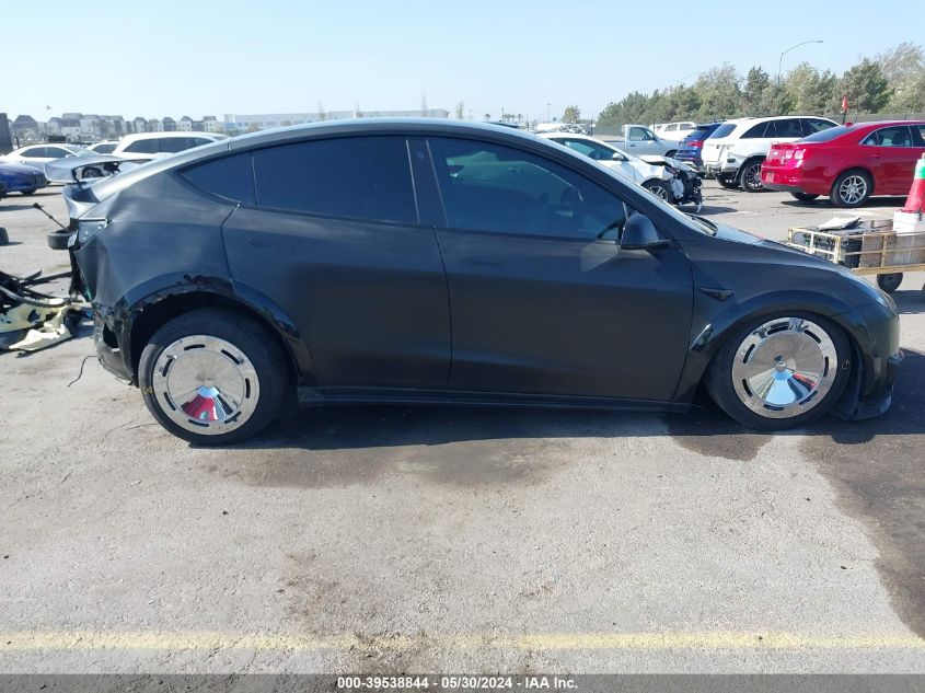 2023 Tesla Model Y Awd/Long Range Dual Motor All-Wheel Drive VIN: 7SAYGAEE5PF588355 Lot: 39538844