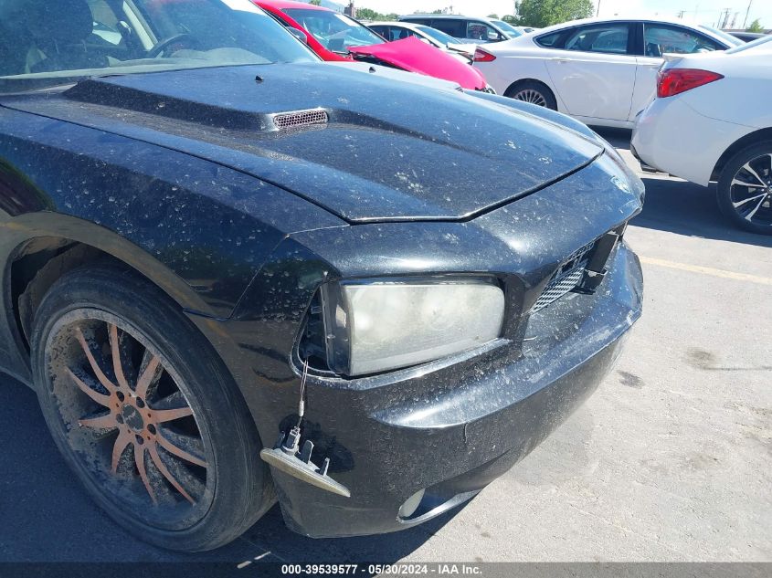 2009 Dodge Charger Sxt VIN: 2B3KA33V79H562017 Lot: 39539577