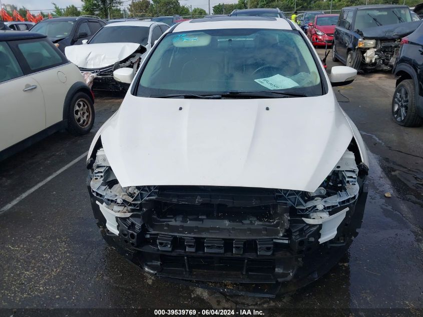 2016 Ford Focus Titanium VIN: 1FADP3J2XGL200817 Lot: 39539769