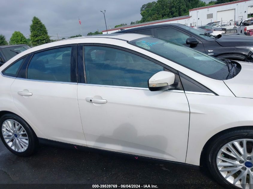 2016 Ford Focus Titanium VIN: 1FADP3J2XGL200817 Lot: 39539769