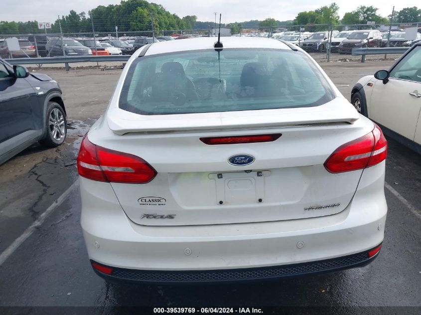 2016 Ford Focus Titanium VIN: 1FADP3J2XGL200817 Lot: 39539769