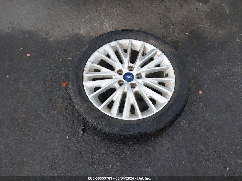 2016 Ford Focus Titanium VIN: 1FADP3J2XGL200817 Lot: 39539769