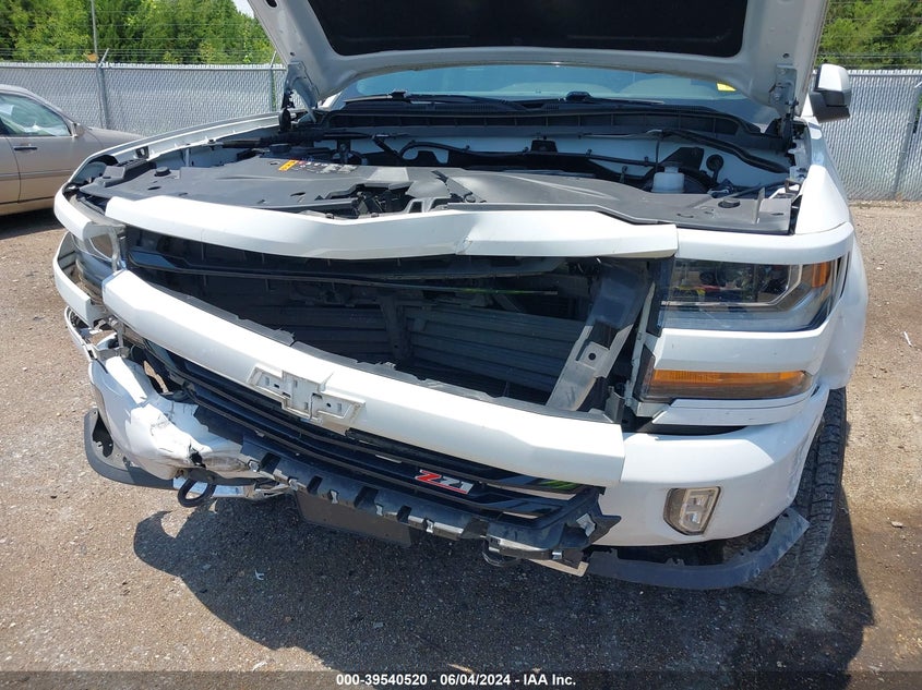 2018 Chevrolet Silverado 1500 2Lt VIN: 3GCUKREC0JG611789 Lot: 39540520