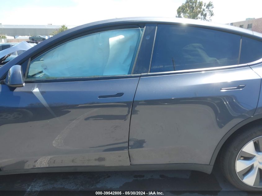 2023 Tesla Model Y Rwd VIN: 7SAYGDED9PF957744 Lot: 39542805