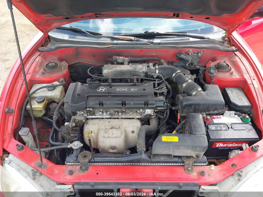 1999 Hyundai Tiburon VIN: KMHJG24F2XU141953 Lot: 39543382