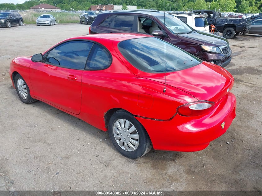 1999 Hyundai Tiburon VIN: KMHJG24F2XU141953 Lot: 39543382