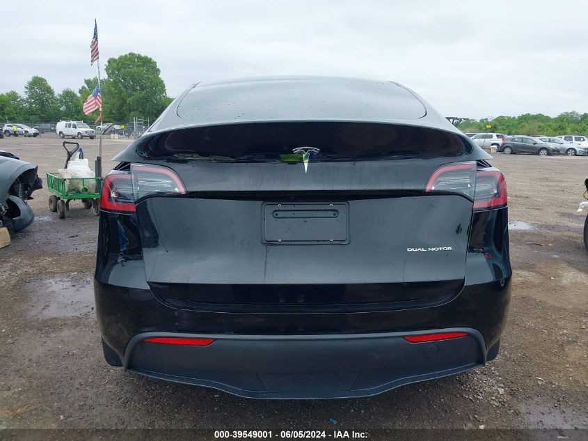 2023 Tesla Model Y Awd/Long Range Dual Motor All-Wheel Drive VIN: 7SAYGDEE8PF704424 Lot: 39549001