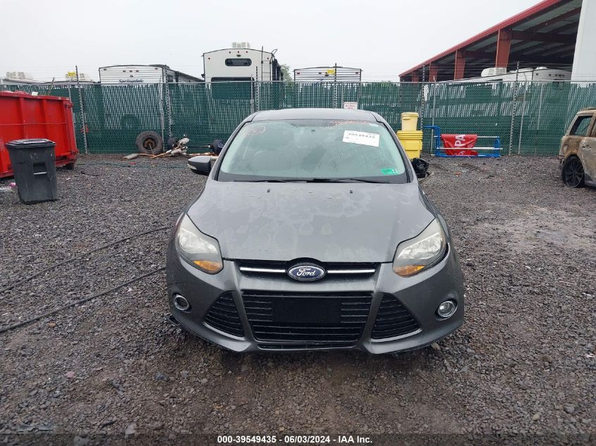 2014 Ford Focus Titanium VIN: 1FADP3J23EL299073 Lot: 39549435