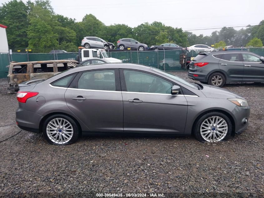 2014 Ford Focus Titanium VIN: 1FADP3J23EL299073 Lot: 39549435