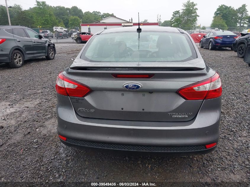 2014 Ford Focus Titanium VIN: 1FADP3J23EL299073 Lot: 39549435