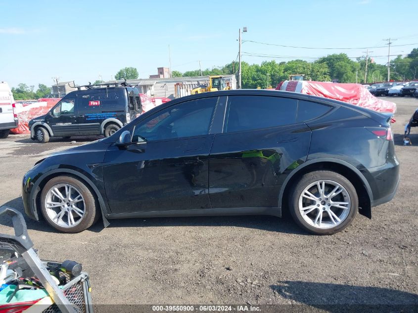 2023 Tesla Model Y Awd/Long Range Dual Motor All-Wheel Drive VIN: 7SAYGDEE8PF763263 Lot: 39550900