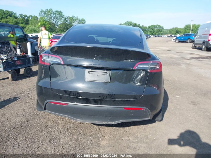 2023 Tesla Model Y Awd/Long Range Dual Motor All-Wheel Drive VIN: 7SAYGDEE8PF763263 Lot: 39550900