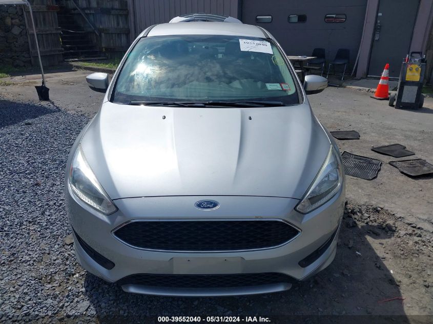 2015 Ford Focus Se VIN: 1FADP3F20FL218668 Lot: 39552040