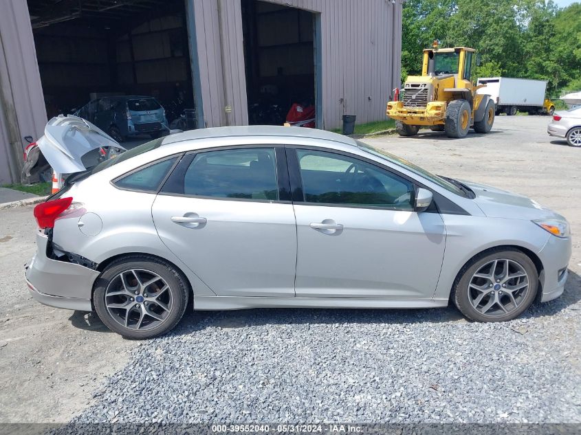 2015 Ford Focus Se VIN: 1FADP3F20FL218668 Lot: 39552040