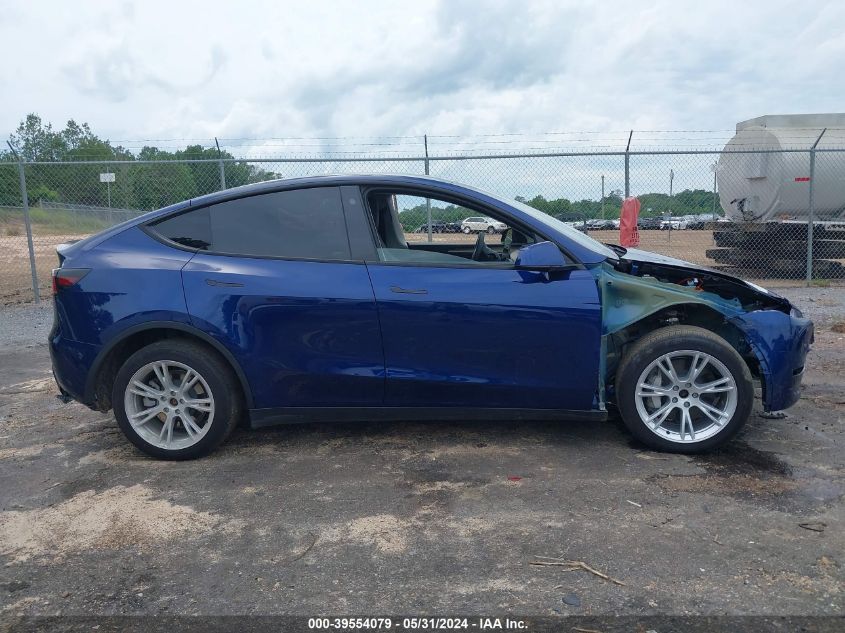 2023 Tesla Model Y Awd/Long Range Dual Motor All-Wheel Drive VIN: 7SAYGDEE5PA060314 Lot: 39554079