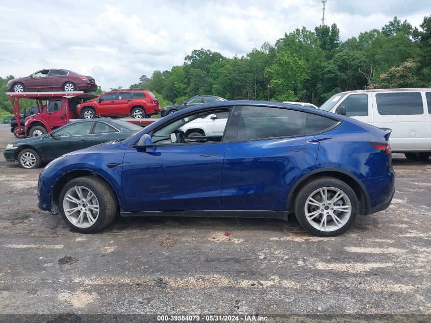 2023 Tesla Model Y Awd/Long Range Dual Motor All-Wheel Drive VIN: 7SAYGDEE5PA060314 Lot: 39554079