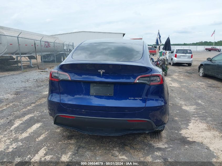 2023 Tesla Model Y Awd/Long Range Dual Motor All-Wheel Drive VIN: 7SAYGDEE5PA060314 Lot: 39554079