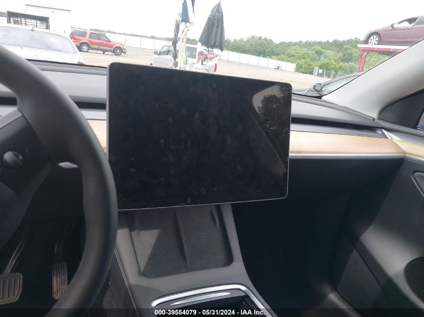 2023 Tesla Model Y Awd/Long Range Dual Motor All-Wheel Drive VIN: 7SAYGDEE5PA060314 Lot: 39554079