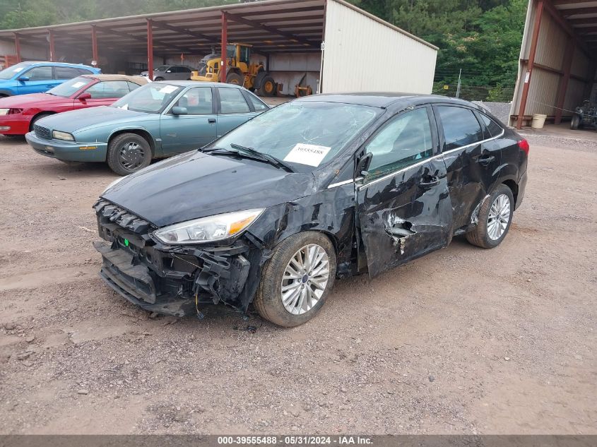 2016 Ford Focus Titanium VIN: 1FADP3J27GL236447 Lot: 39555488