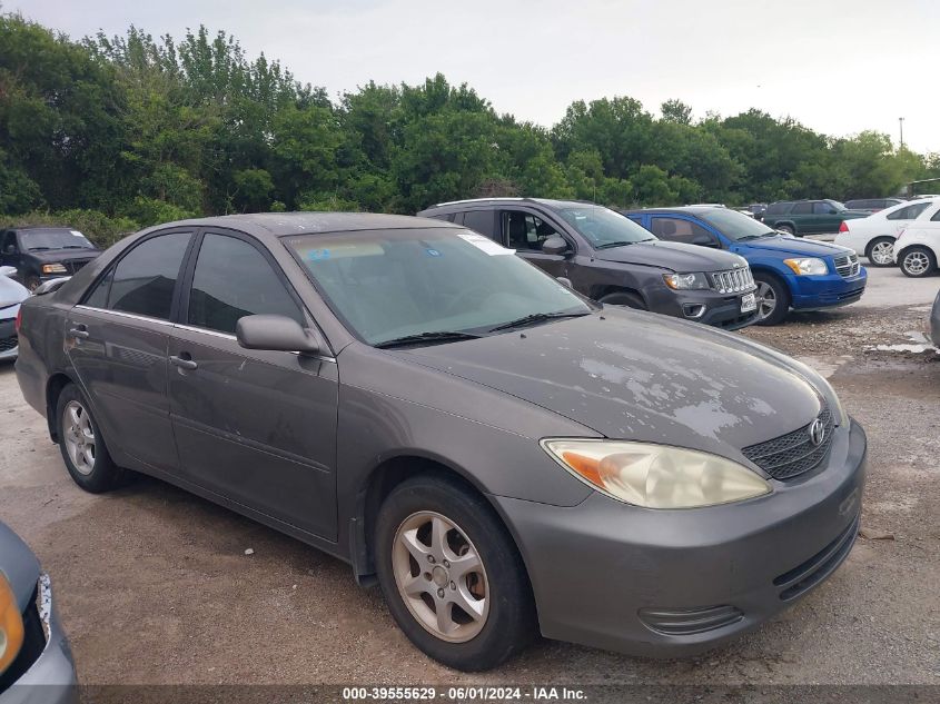 2003 Toyota Camry Le VIN: 4T1BE30KX3U697361 Lot: 39555629