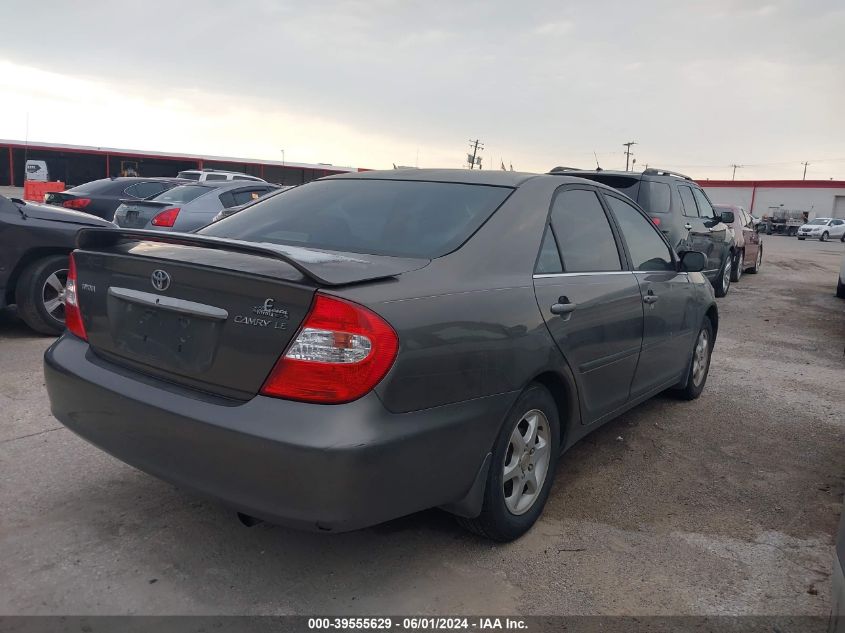 2003 Toyota Camry Le VIN: 4T1BE30KX3U697361 Lot: 39555629