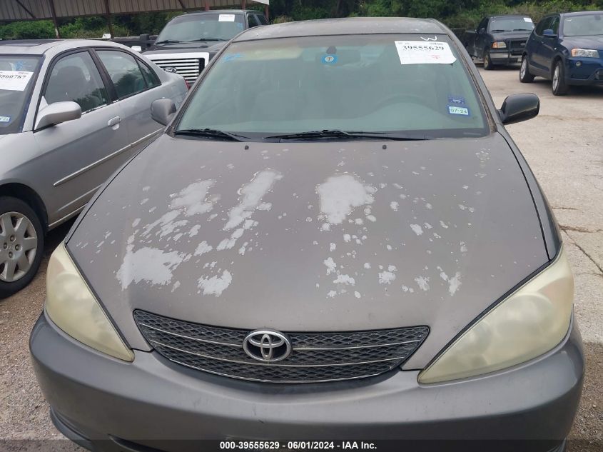 2003 Toyota Camry Le VIN: 4T1BE30KX3U697361 Lot: 39555629