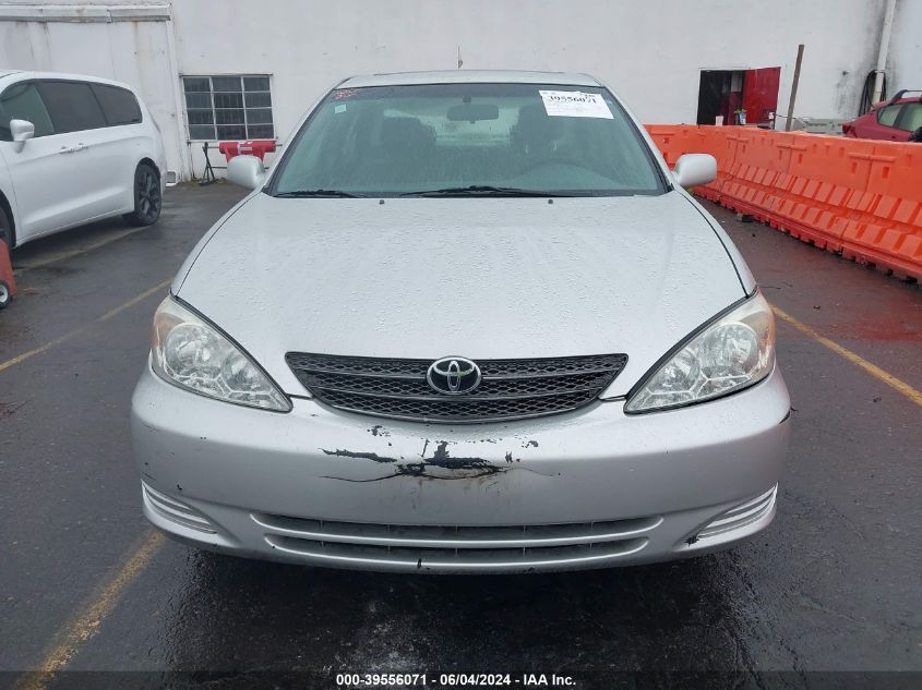 2003 Toyota Camry Le V6 VIN: 4T1BF32K03U561704 Lot: 39556071