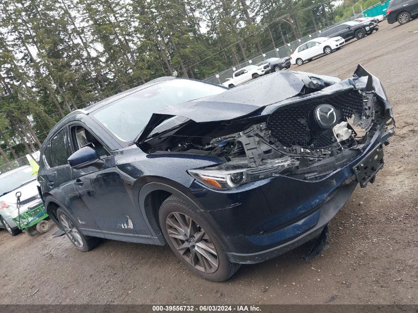 2021 Mazda Cx-5 Grand Touring VIN: JM3KFBDM7M0414874 Lot: 39556732