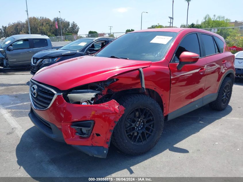 2016 Mazda Cx-5 Touring VIN: JM3KE2CY2G0671095 Lot: 39556875