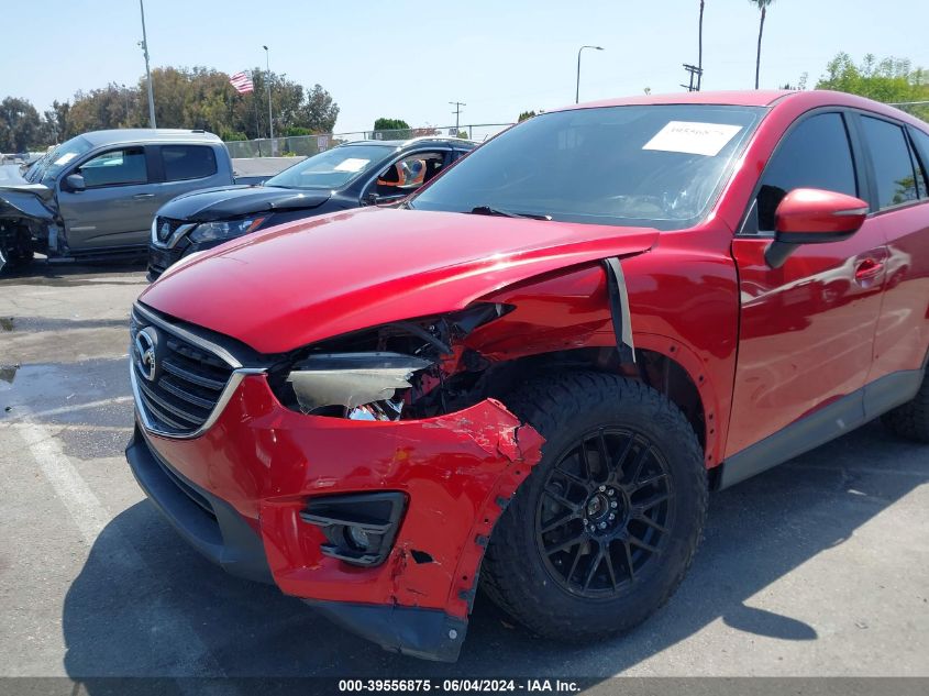 2016 Mazda Cx-5 Touring VIN: JM3KE2CY2G0671095 Lot: 39556875