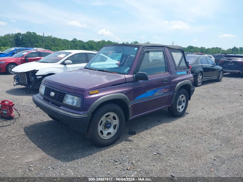 1995 Geo Tracker VIN: 2CNBE18U0S6907859 Lot: 39557817