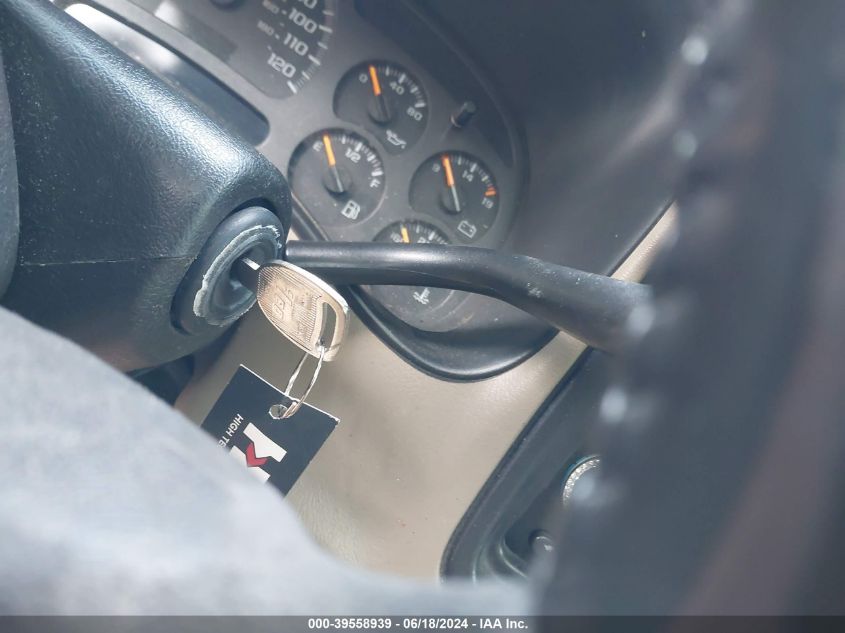 2003 Chevrolet Tahoe Lt VIN: 1GNEC13Z23J176521 Lot: 39558939