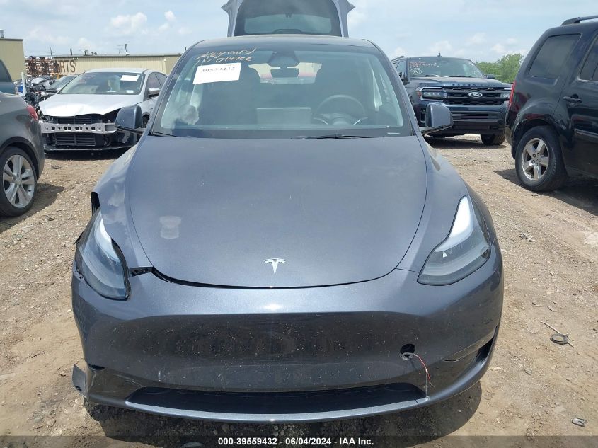 2023 Tesla Model Y Awd/Long Range Dual Motor All-Wheel Drive VIN: 7SAYGDEE4PA205052 Lot: 39559432