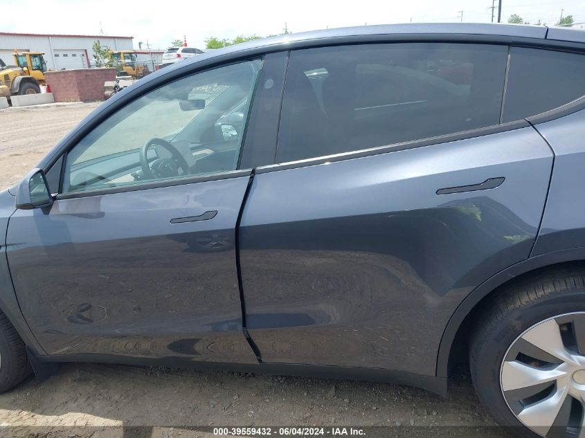 2023 Tesla Model Y Awd/Long Range Dual Motor All-Wheel Drive VIN: 7SAYGDEE4PA205052 Lot: 39559432