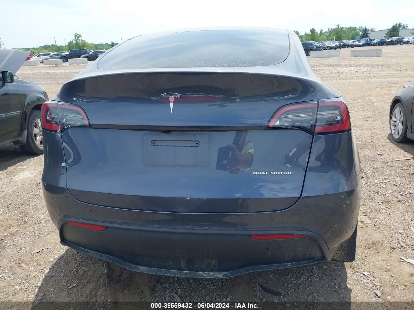 2023 Tesla Model Y Awd/Long Range Dual Motor All-Wheel Drive VIN: 7SAYGDEE4PA205052 Lot: 39559432