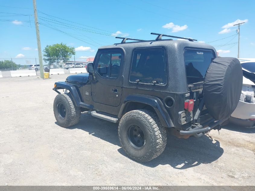 2004 Jeep Wrangler Sahara VIN: 1J4FA59SX4P703184 Lot: 39559614