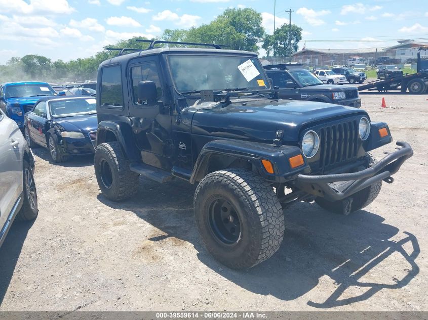 2004 Jeep Wrangler Sahara VIN: 1J4FA59SX4P703184 Lot: 39559614